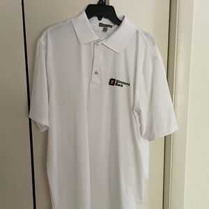 White Peter Millar polo with Simmons Bank logo. Will Zalatoris brand!